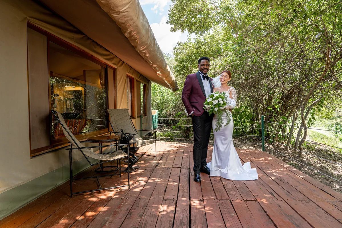 A couple on their wedding day at PrideInn Mara Camp